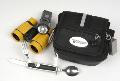 This travel carry case with zippered pocket has mesh slash pocket, two side pockets, and back pocket. Kit contains a carabiner, whistle, flint case, compass, utensil set (with spoon, fork, knife, and bottle opener multi-tool), 4 x 30 rubber coated binoculars, and swivel-head flashlight. The adjustable waist belt keeps your hands free!